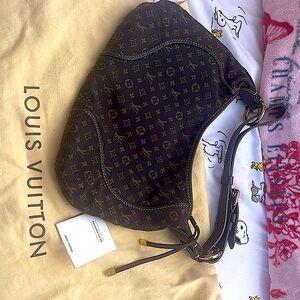 SOLDLouis Vuitton Mini Lin Ebene in excellent condition. Hardly used. Authentic.